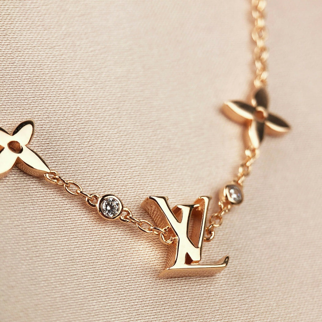 ¡®Lume Jewels¡¯STAR AND SUN 7 MOTIFS GOLD BRACELET