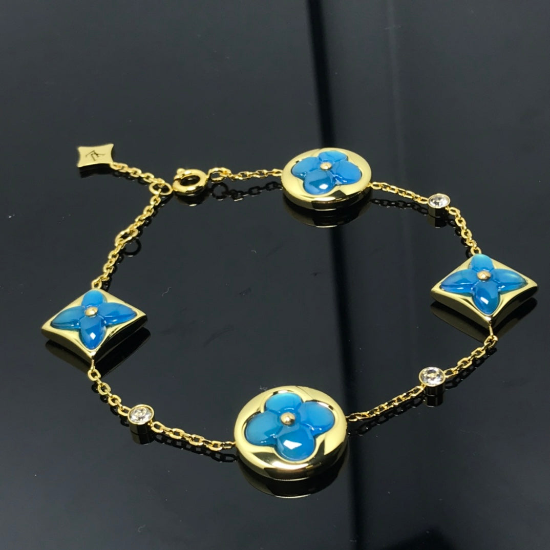 ¡®Lume Jewels¡¯STAR AND SUN 4 MOTIF BLUE BRACELET